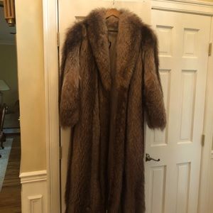 Full length raccoon coat.